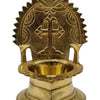 Brass cross lamp, Christian cross set in a rayed arch backplate above an oil bowl and stepped base