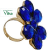 Fancy Designer Stone Ring, a gold-toned ring featuring six faceted dark blue stones arranged in a floral cluster