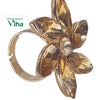Fancy Designer Stone Ring, a gold-toned ring featuring six faceted amber-coloured stones and one central clear round stone arranged in a flower motif
