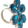 Fancy Designer Stone Ring, a gold-toned adjustable ring featuring a flower motif set with six faceted teal-coloured stones and one central stone