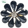 Fancy Designer Stone Ring, flower shape with black pear-shaped stones and clear round stones