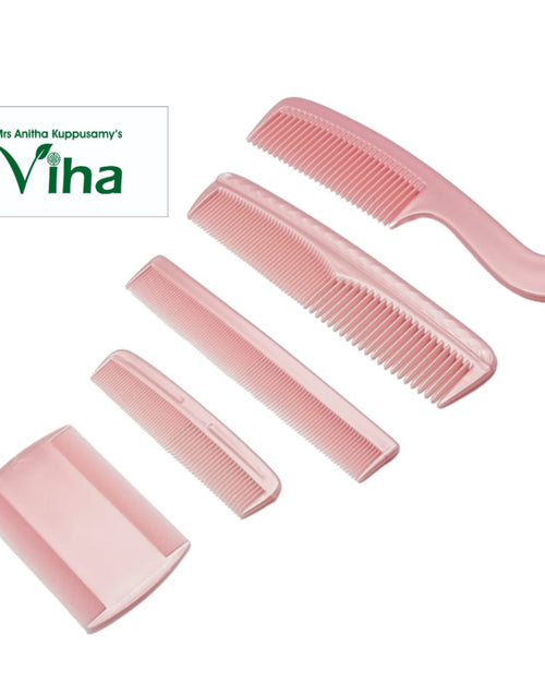 Comb Combo Set of five pink combs in different sizes and tooth spacing