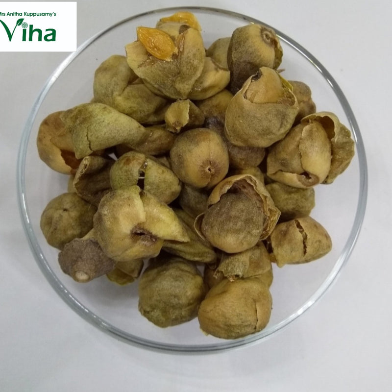 Sukkangai Fryums in a glass bowl with dried fruit pods
