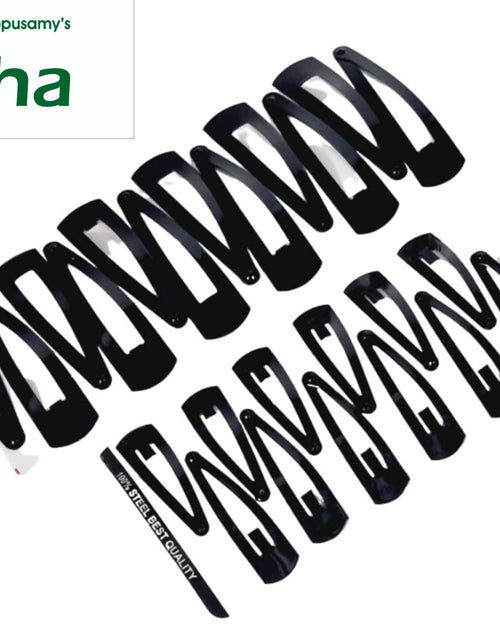 Tip Hair Clip, fourteen black matte snap hair clips arranged diagonally on a white background