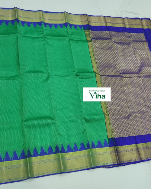 Pure Kanchipuram Silk Saree, a green and blue textile with gold-toned borders and geometric patterned panels