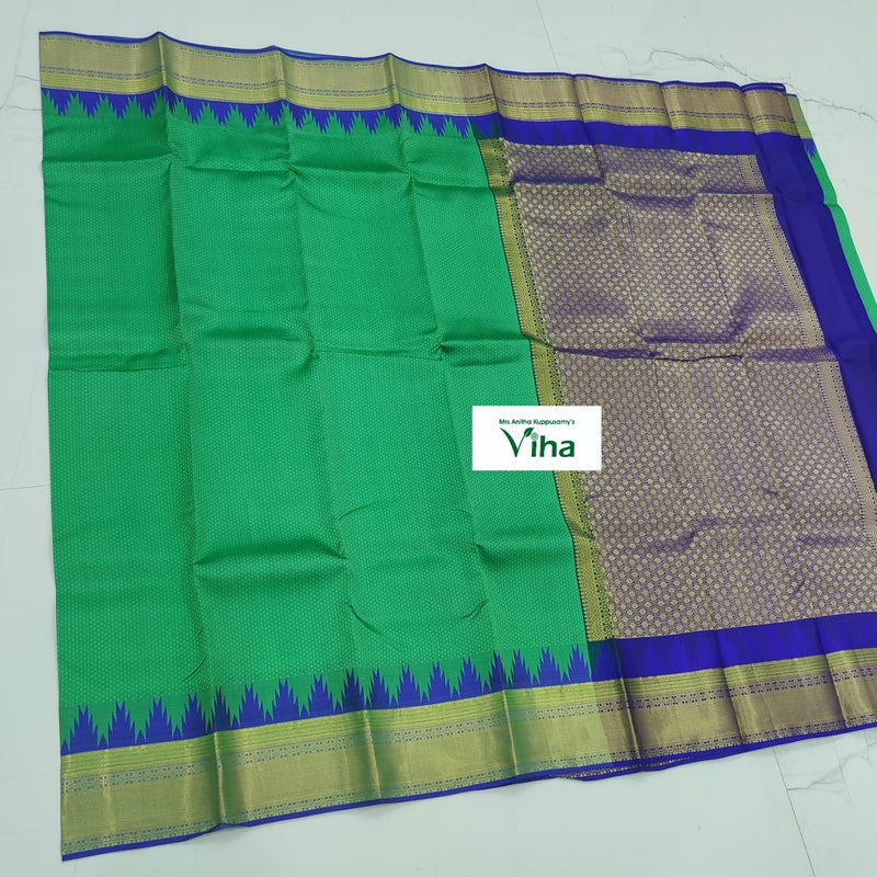 Pure Kanchipuram Silk Saree, a green and blue textile with gold-toned borders and geometric patterned panels