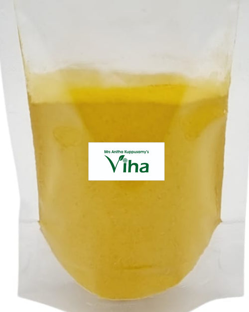Ponnatharam Powder, a transparent plastic pouch filled with opaque yellow viscous liquid features a central white rectangular label with green text