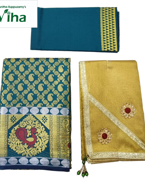 Apoorva Silk Half Saree Set in blue with a paisley pattern and peacock motif