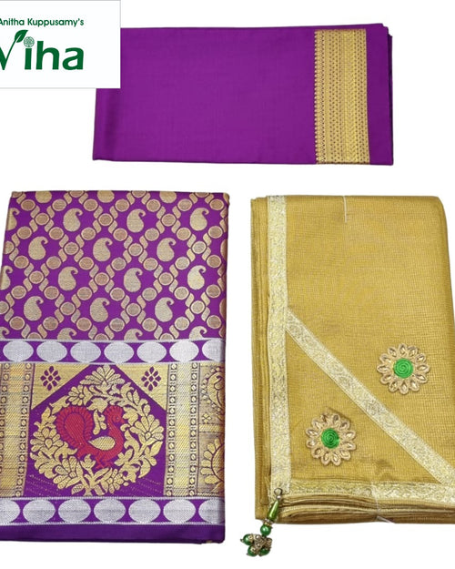Apoorva Silk Half Saree Set, a purple textile with gold-toned and silver-toned woven patterns, alongside a folded gold-toned textile
