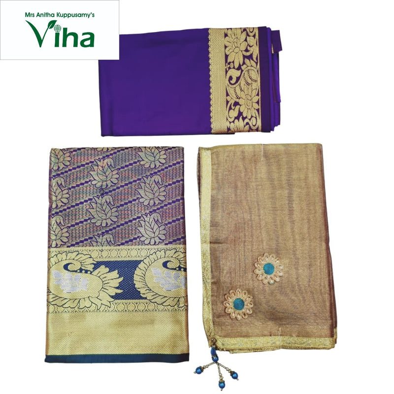 Apoorva Silk Half Saree Set, a folded purple fabric, a folded patterned fabric, and a folded brown fabric with two floral appliqués