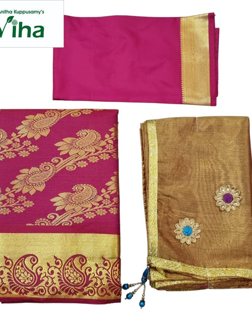 Apoorva Silk Half Saree Set, a magenta-and-gold-toned fabric set with a patterned fold, a flat piece and a brown-toned piece featuring two floral motifs