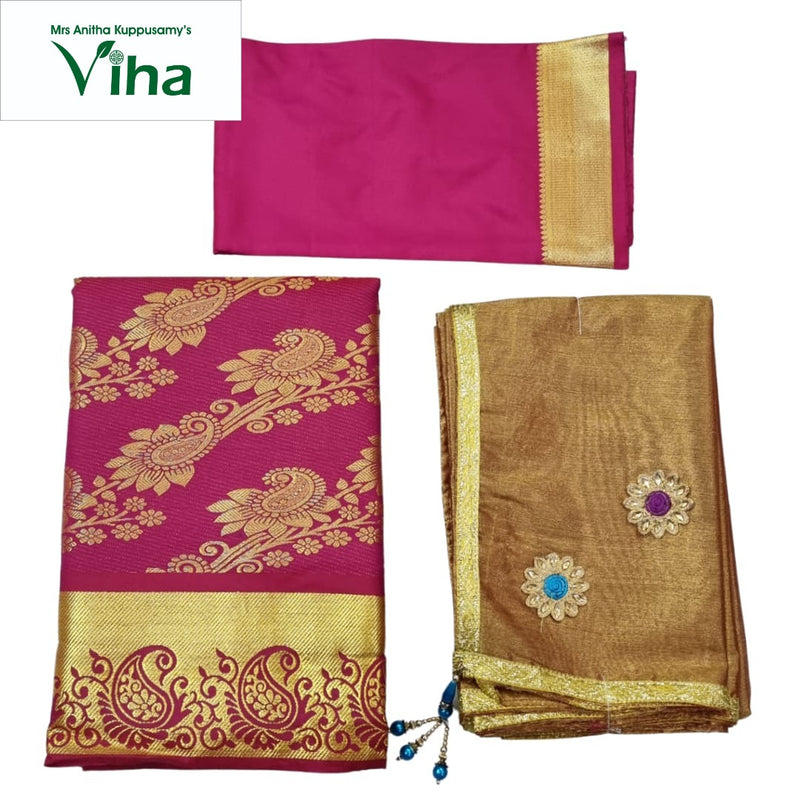 Apoorva Silk Half Saree Set, a magenta-and-gold-toned fabric set with a patterned fold, a flat piece and a brown-toned piece featuring two floral motifs