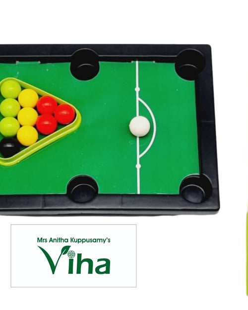 Snooker game for children with a green pool table, balls and cues