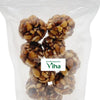 Sweet Peanut balls, transparent pouch with glazed round objects