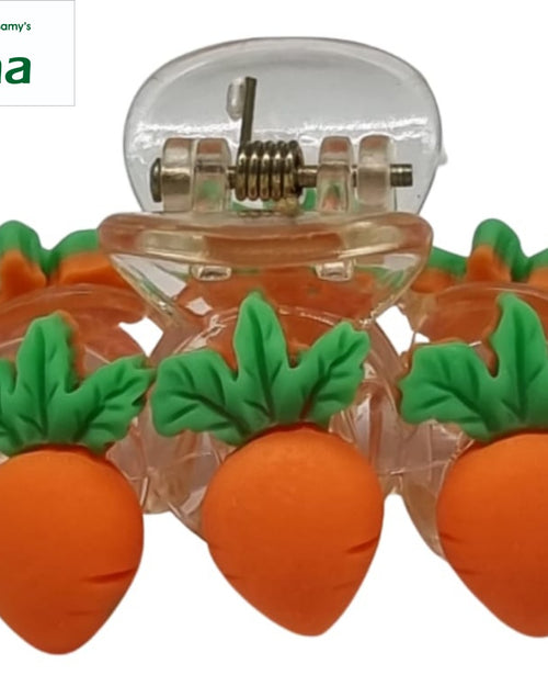 Premium Quality Strong Hair Clip, a transparent plastic claw hair clip adorned with six orange carrot charms featuring green leaves