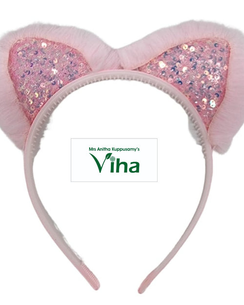 Rabbit Ear Glitter Chumki Hair Band, a pink headband with fuzzy-edged cat ears inset with reflective pink sequins and an inner ridged band