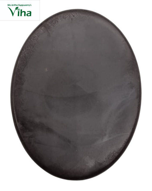 Shampoo Bar For Oily Hair, an oval, dark grey, matte-finished stone with subtle swirling patterns