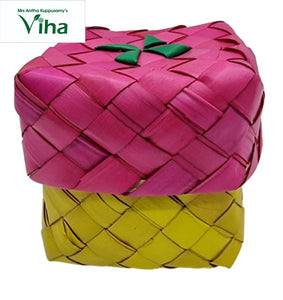 Palm woven box with flower on top