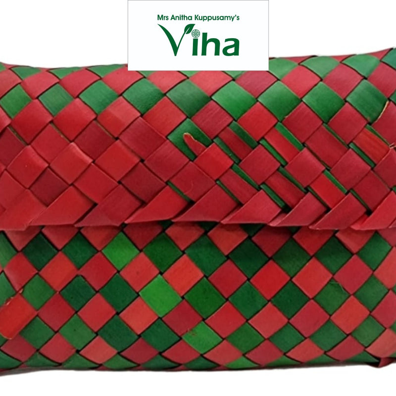Palm Woven Pouch, a red and green woven rectangular envelope-style pouch featuring a diagonal plaid pattern across its entire surface