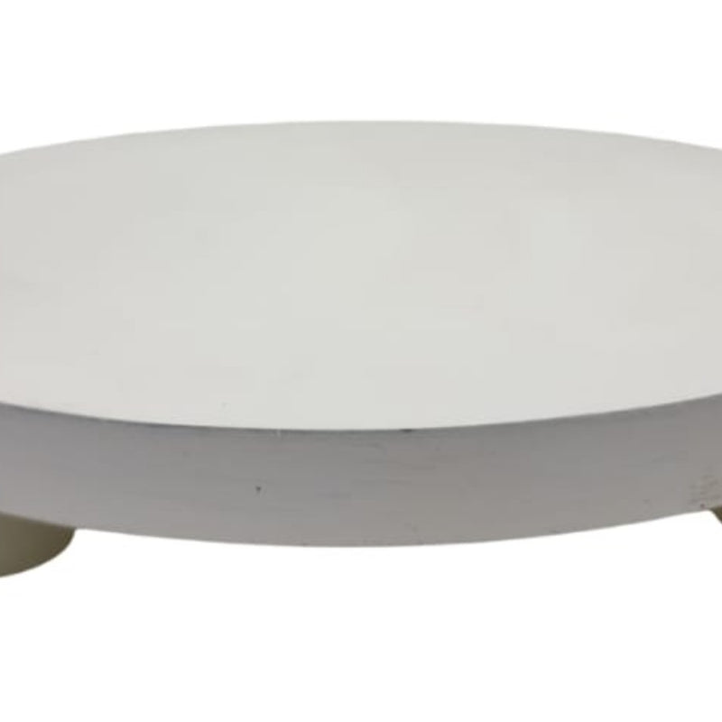 Wooden Chapati Rolling Chakla, a white round board standing on three short feet