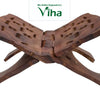 Wooden Hand Carved Holy Book Stand Worked with Brass, a brown wooden folding book stand featuring carved geometric cutouts across its two panels