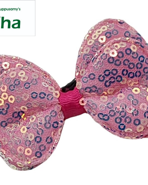 Designer Hair Clip, a pink sequined bow featuring iridescent disks and a central ribbed knot