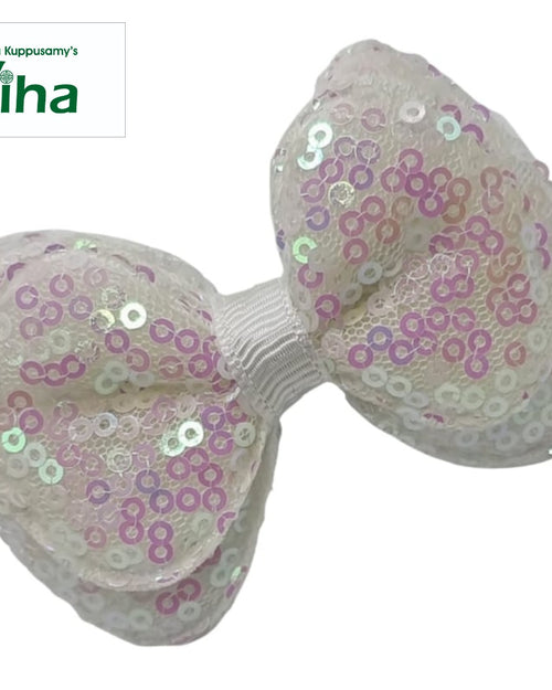Designer Hair Clip, a bow covered in iridescent white sequins