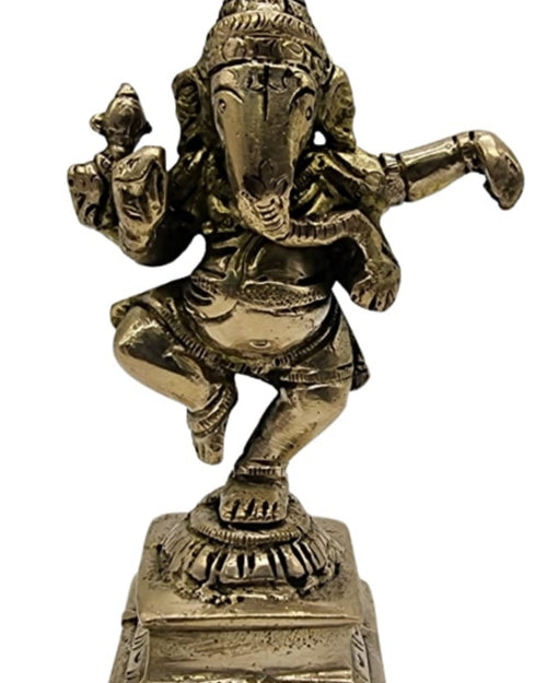 Nardhana Ganesha in brass, elephant-headed figure dancing with one leg raised on a square stepped base
