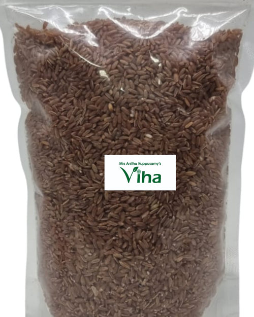 Traditional Rathasali Rice Boiled, in a transparent plastic pouch containing reddish-brown grains