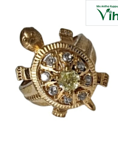 Impon Ring with a turtle top on a curved base