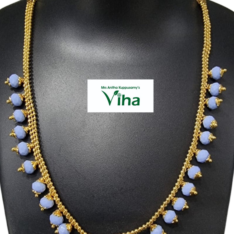 Impon Necklace with a multi-strand chain and faceted bead drops