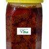 Homemade Mango Thokku, in a tall glass jar with a lid