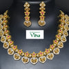 Impon Necklace Set with matching drop earrings and floral motifs