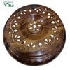 Wooden Dry Fruit Box, a round brown wooden container features a lid with white inlay patterns, a central floral motif, and a scalloped white inlay border