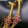 Impon Bangles with flower-shaped cluster and pink stones