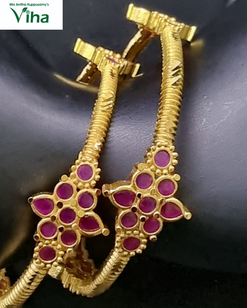 Impon Bangles, curved bands decorated with ribbed clusters
