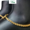 Impon Kolusu, a gold-toned circular-link anklet chain worn on a mannequin ankle