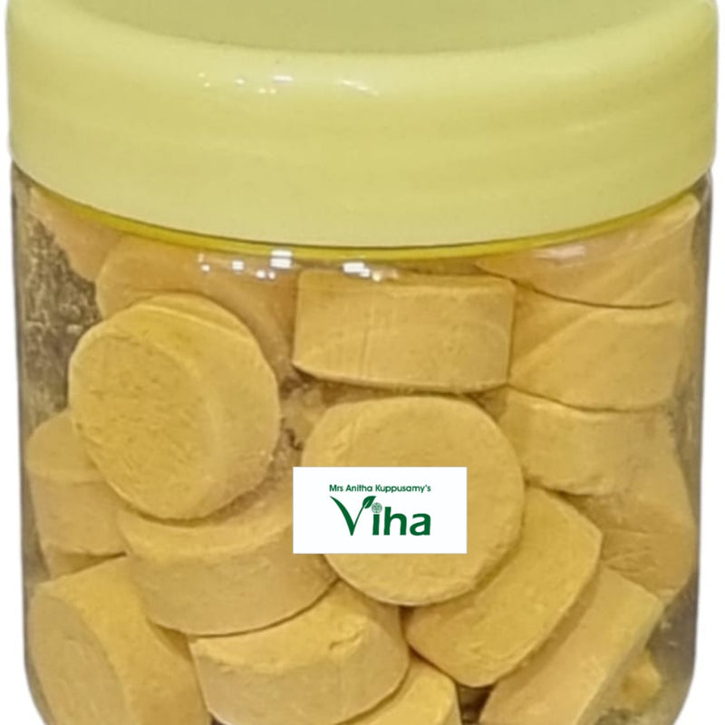 Sandal Tablets, a clear plastic jar of yellowish discs with a yellow lid