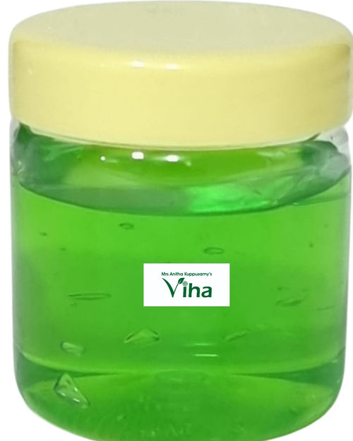 Tea Tree Gel, a clear round jar with a glossy light-yellow cap contains translucent green gel featuring several embedded air bubbles