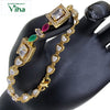 Impon bracelet, gold-toned bracelet featuring heart-shaped white bead links and two rectangular gemstone-centered stations with colorful side stones