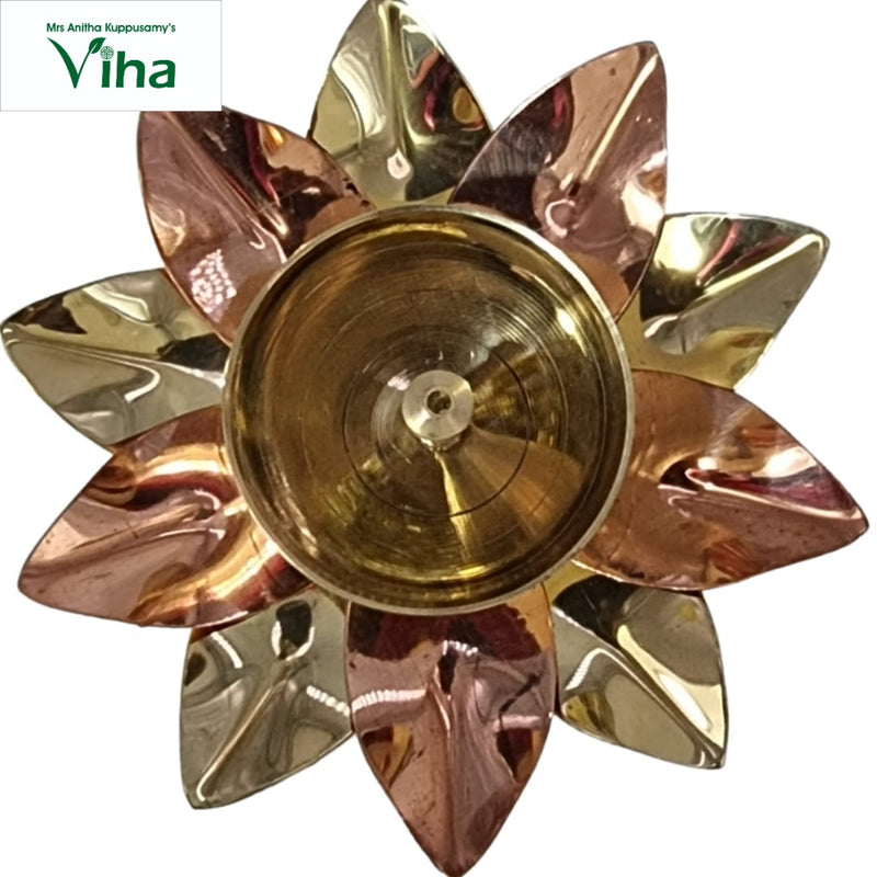 Lotus athma vilakku, alternating copper and brass petals radiating around a domed centre