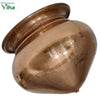 Abisheg Copper Lotta (Copper Sombu), a shiny, copper-coloured metal pot with a wide, bulbous body and a flared rim sits angled on a white surface
