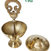 OM Deepam, an open gold-toned metal bowl with an ornate upright handle, a vertical rod inside, and a domed lid beside it