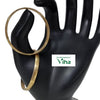 Impon Baby Bangles, two gold-toned metallic bangles display a brushed matte finish on a glossy black hand mannequin