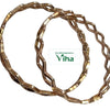 Impon Bangles, two shiny copper-toned circular bangles featuring a wavy geometric openwork design