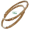Impon Bangles, two gold-toned textured bangles with a wavy cutout pattern displayed diagonally