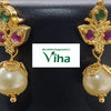 Impon Necklace, two gold-toned hanging earrings with one green stone, two pink stones, and a cream bead each