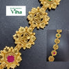 Impon Haram, a gold-toned metallic jewellery chain featuring four circular floral modules with petal shapes and one pink stone inset, plus a smaller inset view