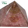 Rose Quartz Pyramid with EMF Protection, a pink pyramidal object containing embedded metallic coils and chips, with a smooth glossy finish