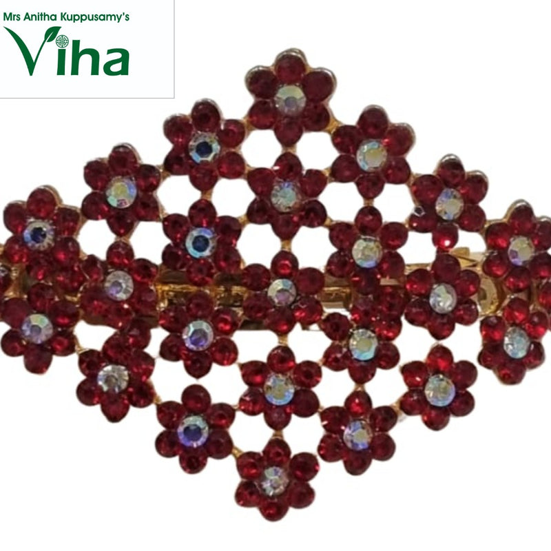 Stone Hair Clip, a gold-toned metal lattice brooch of twenty-six red flower-shaped units, each with a central clear stone